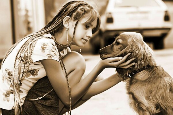 Niña entrena a su perro favorito