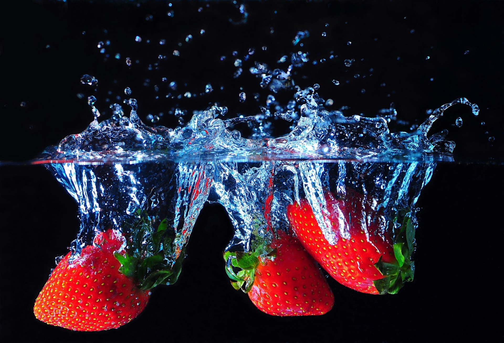 close up berries strawberry water