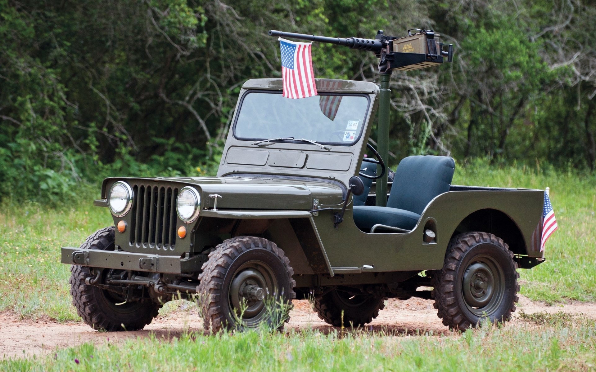 jeep m38 jeep 1950 jeep.suv front flagge gras bäume hintergrund