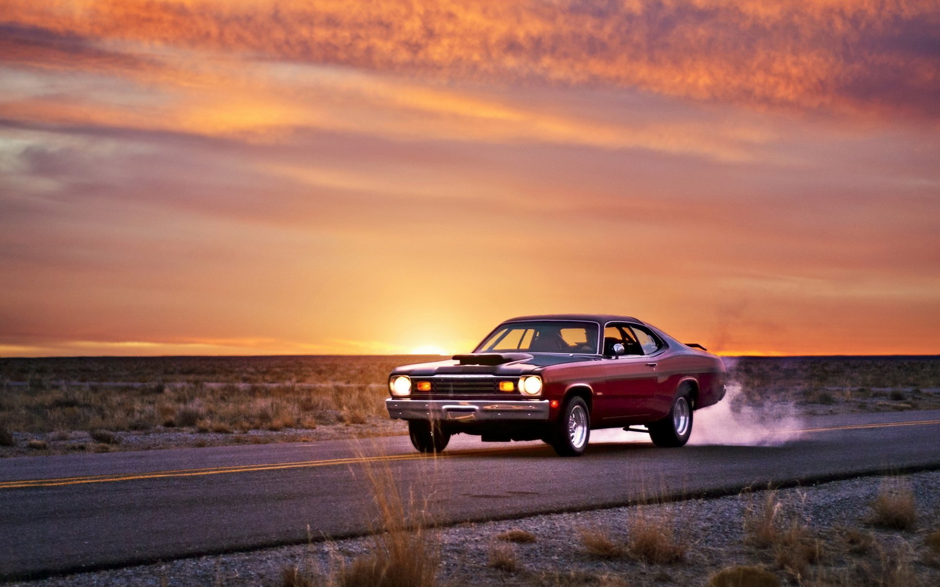 plymouth duster muscle car road sunset