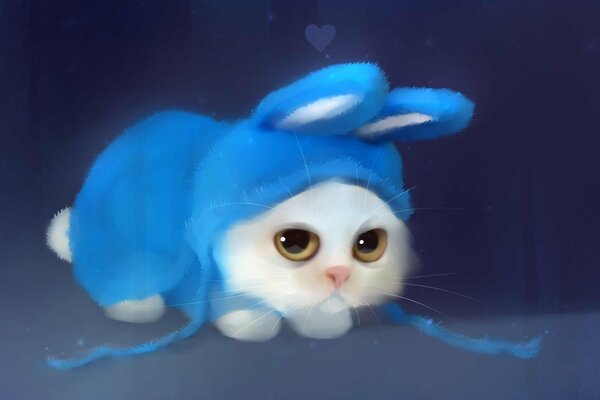 A kitten in a blue bunny costume