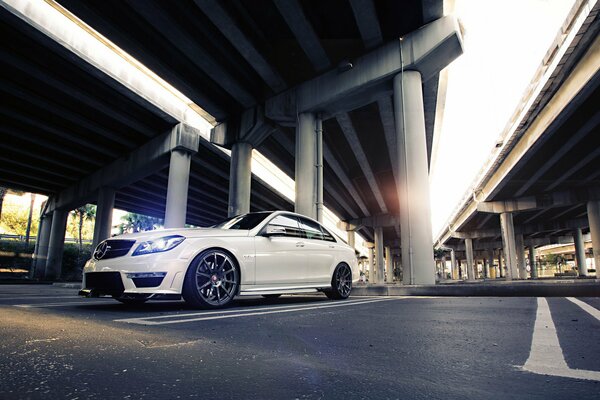 Powerful white mercedes-benz sedan