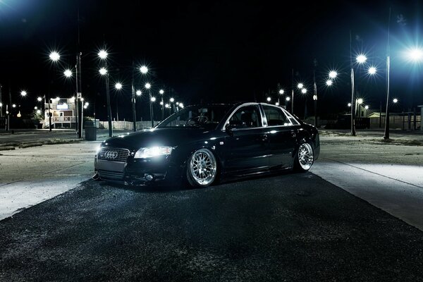 Audi A4 on the background of night lights