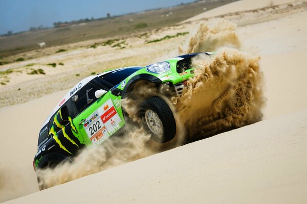 Mini Cooper and tons of sand from under its wheels