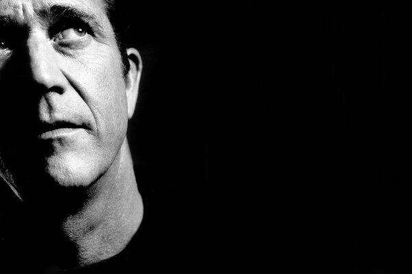 Portrait photo of Mel Gibson on a black background