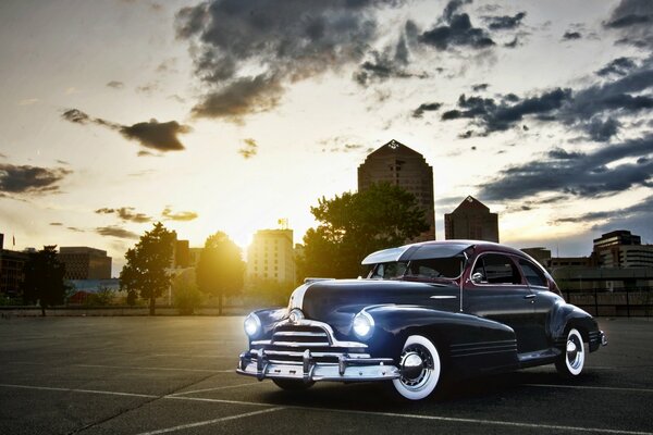 Black Pontiac at a beautiful sunset