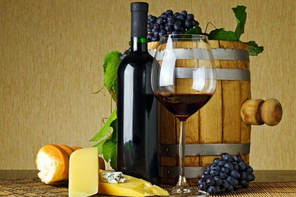 Barril de vino tinto con uvas