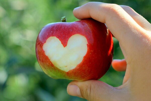 A heart in an apple with your own hands