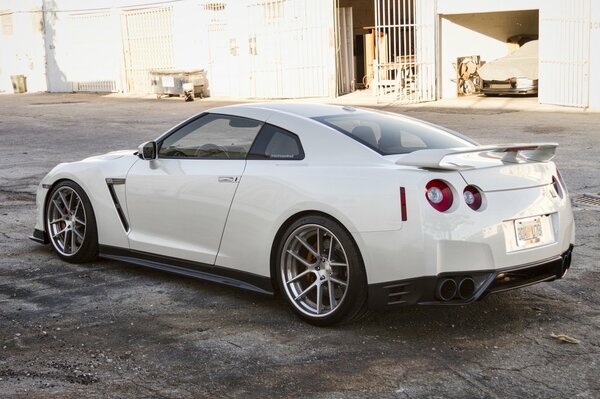 Nissan sports car at the garage