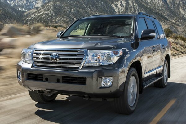 Toyota land cruise car on the road in the mountains