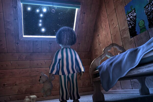 A boy with a bear looking at the stars through the window