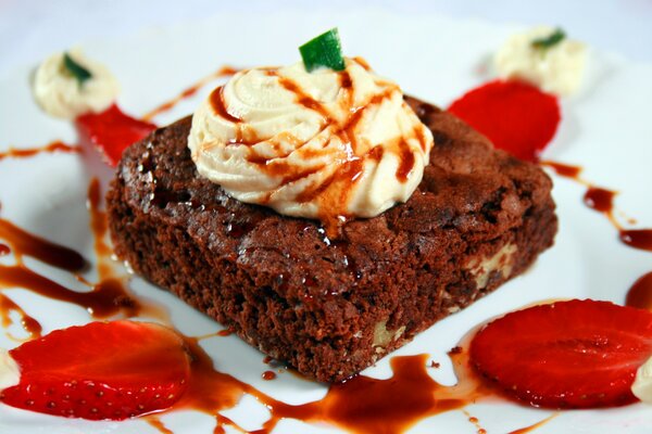 Chocolate square piece of cake with cream