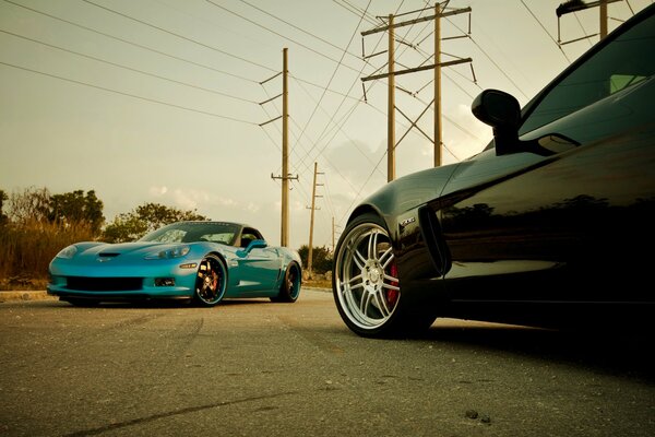 Chevrolet Corvette cars in blue and black