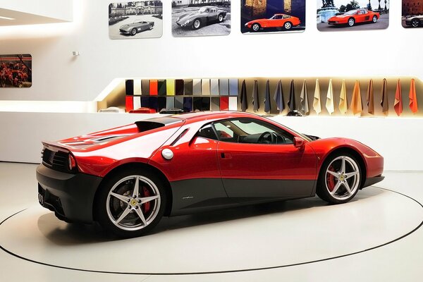 Red ferrari sp12 ec in the garage