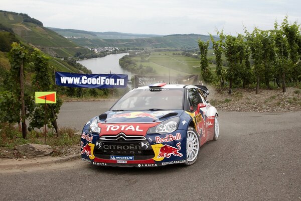 Racing car on the background of the river