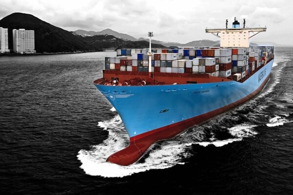 Art photo of a blue ship with containers