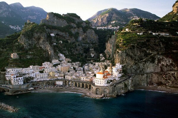 The city of Atrani on the coast near the rocks