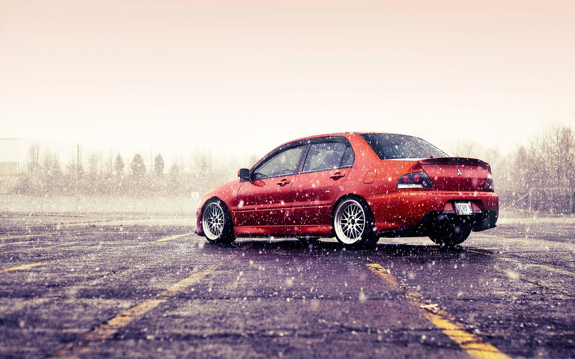 mitsubishi berufe evolution evo mitsubishi lancer evo orange winter schnee