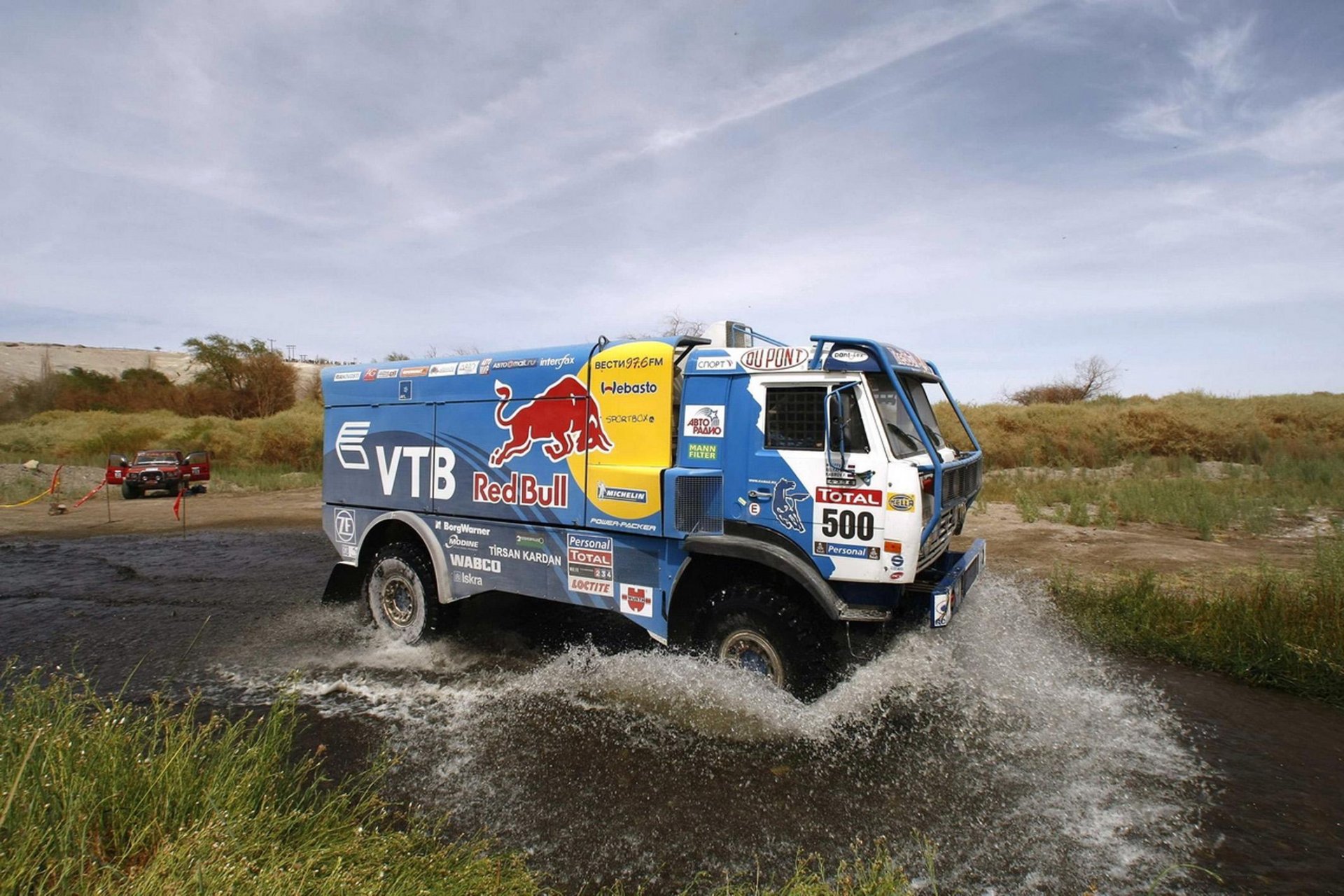 kamaz dakar rally blue red bull water spray