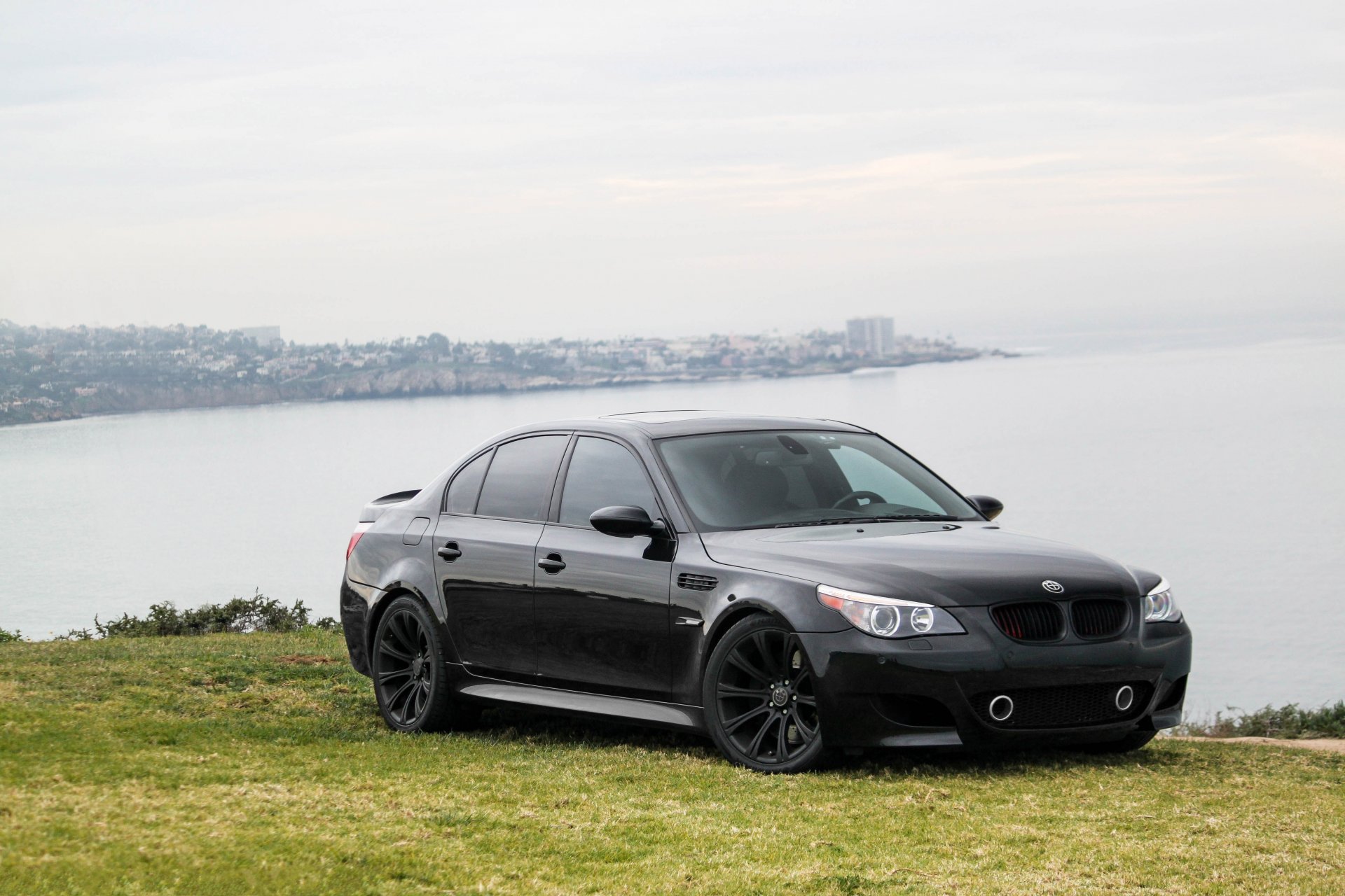 bmw m5 e60 black bmw sport sedan lawn sea sky cloud