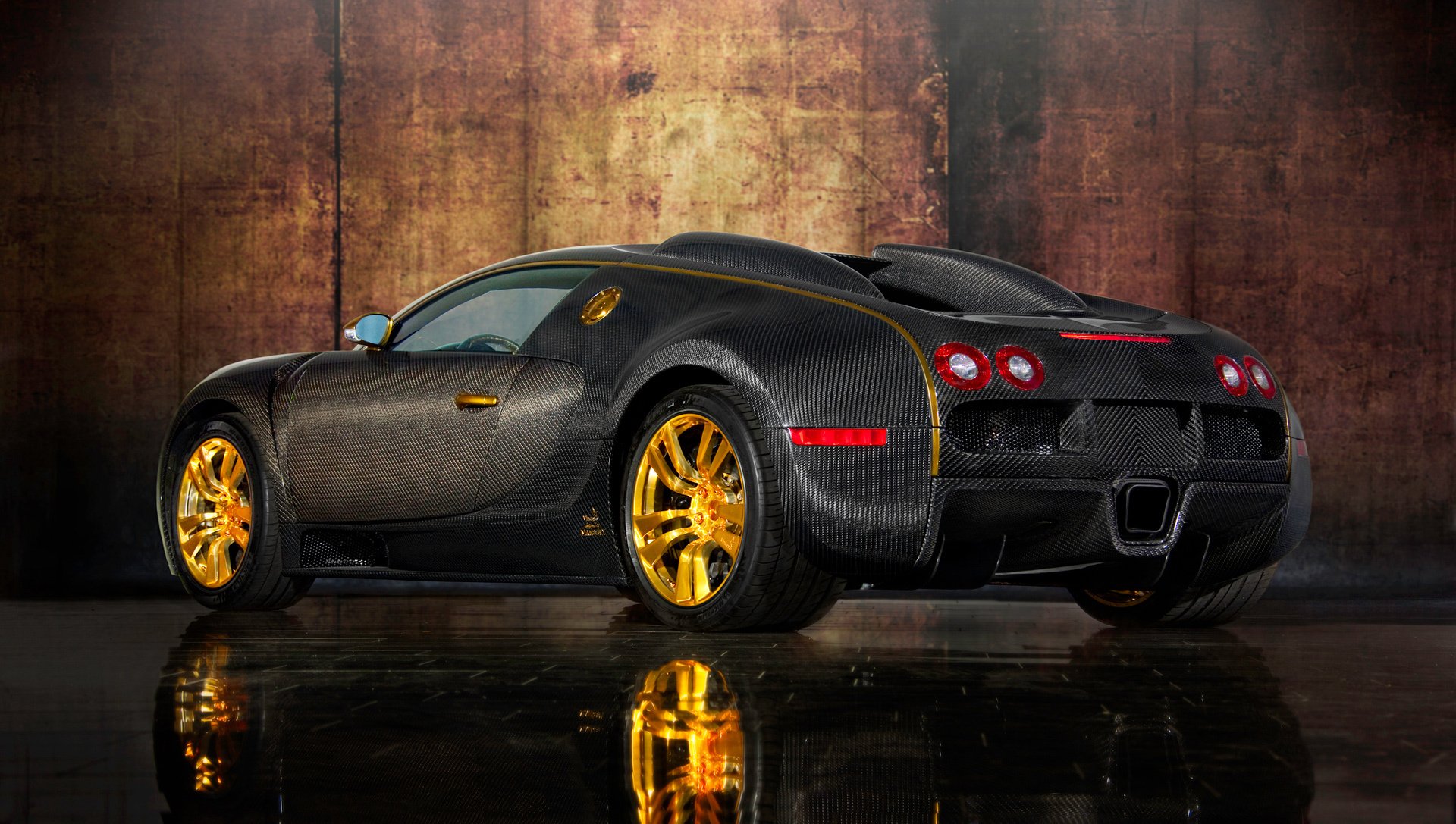 bugatti veyron 16.4 linea vincero d’oro mansory car bugatti veyron sports car body carbon gold design reflection