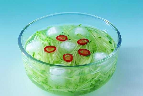 Bowl with herbs and ice cubes