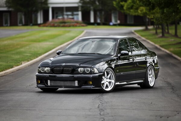 Photo of a black bmw on the road