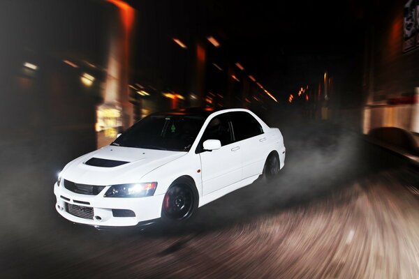 Racing around the city in a mitsubishi car