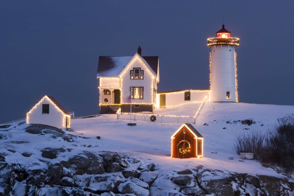 Evening lighthouse on Christmas evening