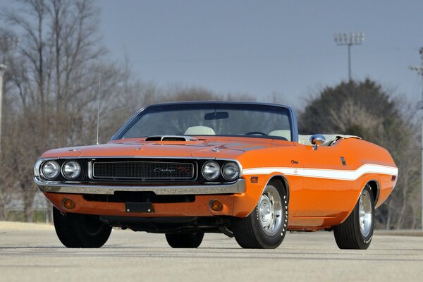 Retro convertible challenger on the road