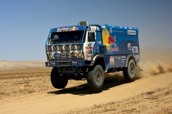 KAMAZ truck powerfully overcomes the way to the rally