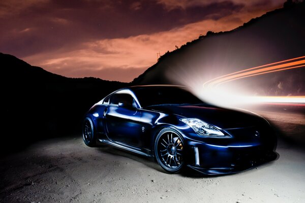 Mesmerizing blue nissan 350z at sunset