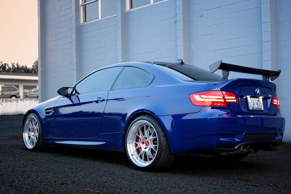 Blue BMW with alloy wheels