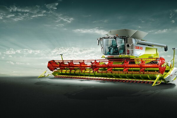 Lexion 770 combine harvester before sunrise