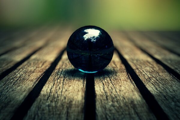 Mirror ball on wooden shelves