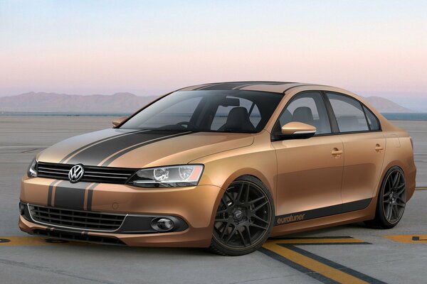 Tuning of the Volkswagen Jetta car in gold color