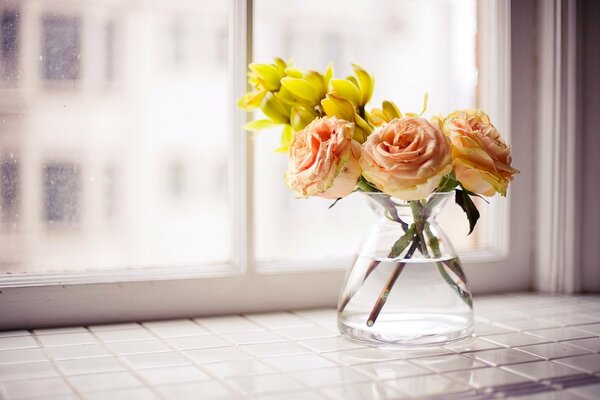 Vase with beautiful yellow flowers