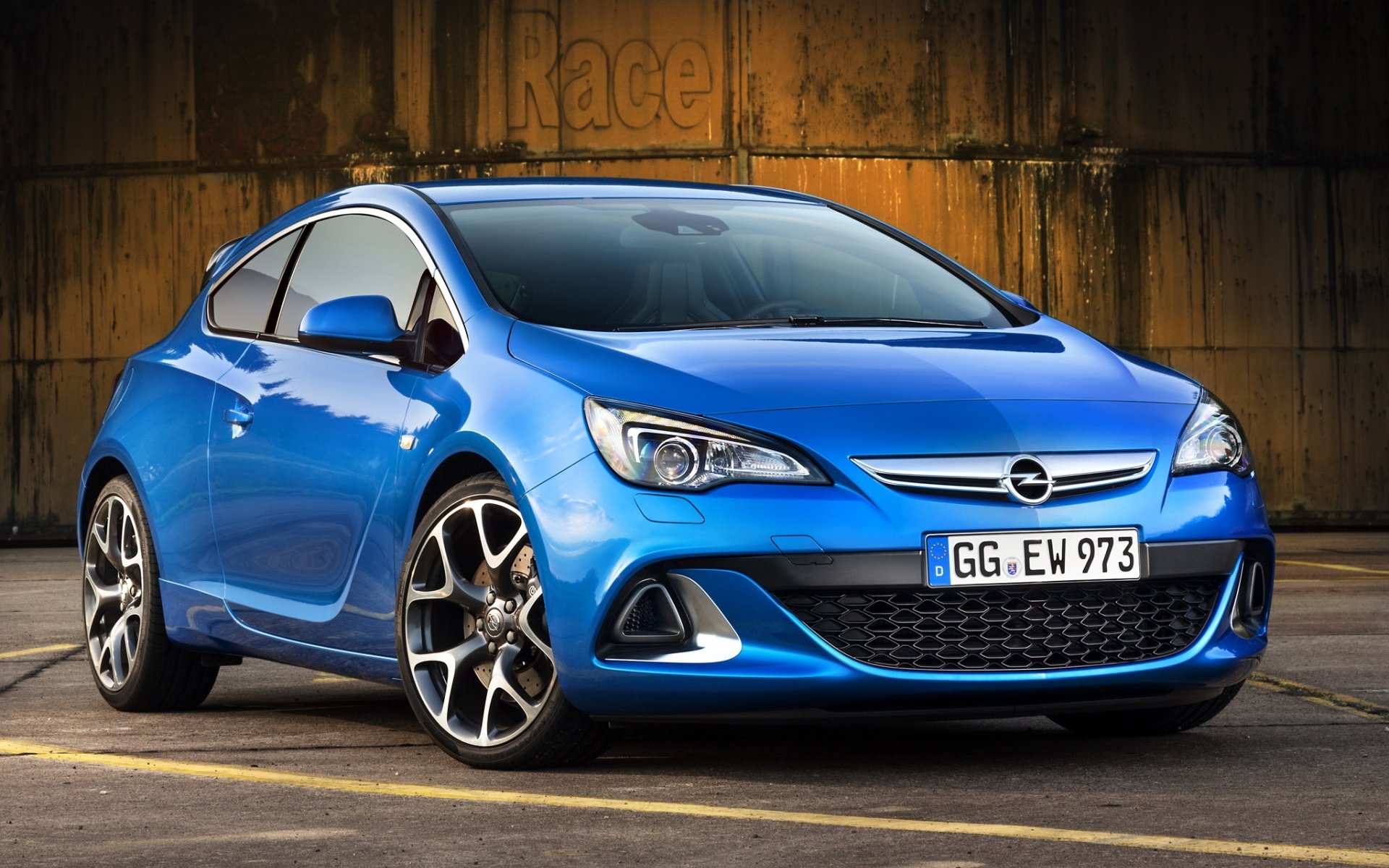 opel astra opc opel astra ops hatchback niebieski przód felgi tło