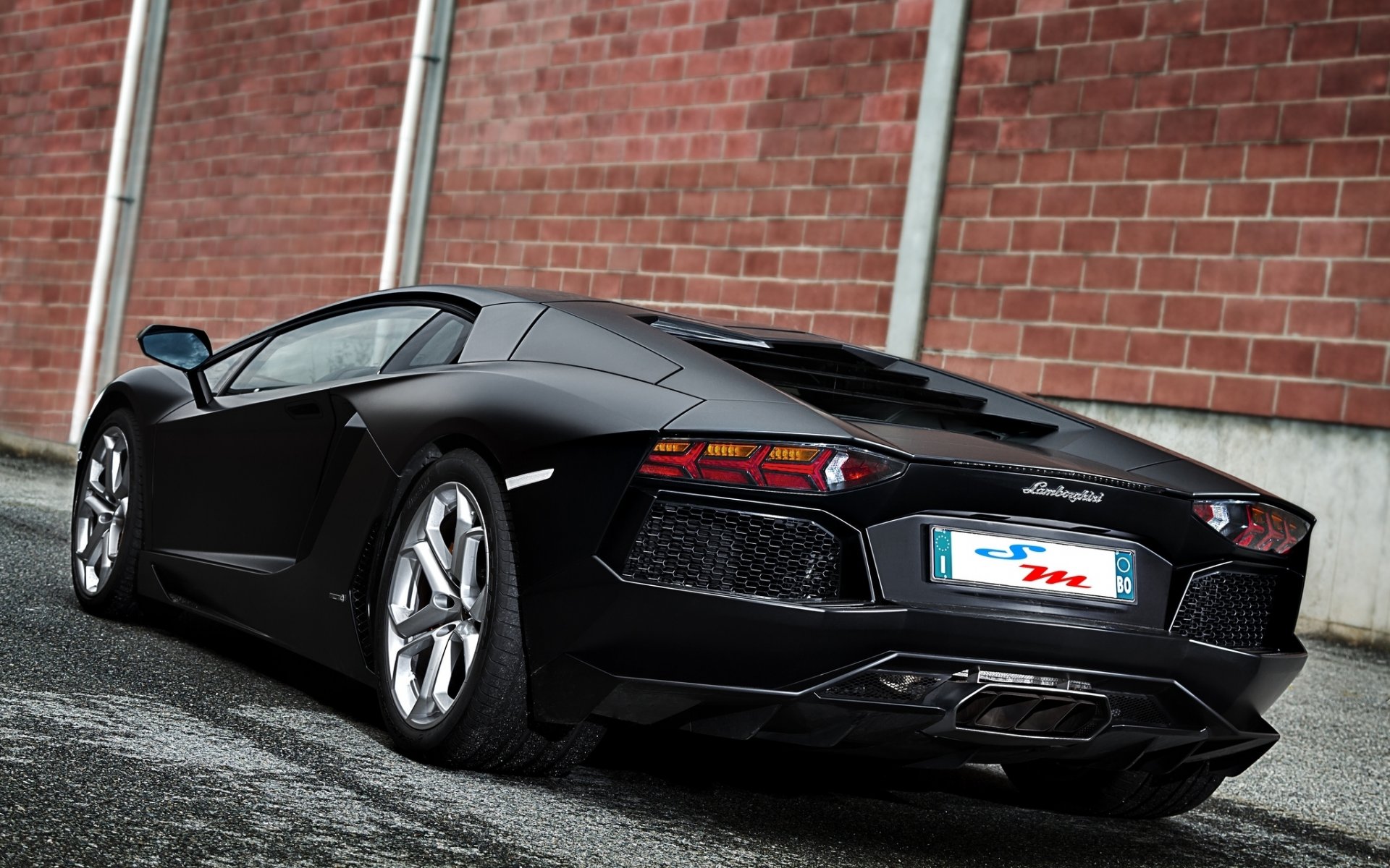 lamborghini aventador lp700-4 matte black lamborghini aventador matte black rear view brick wall