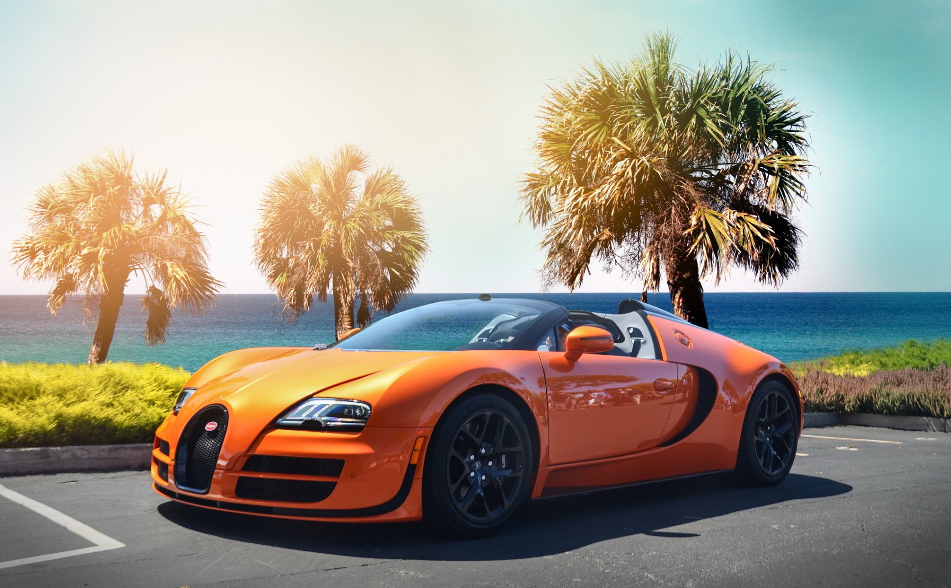 bugatti veyron hypercar orange plage palmiers