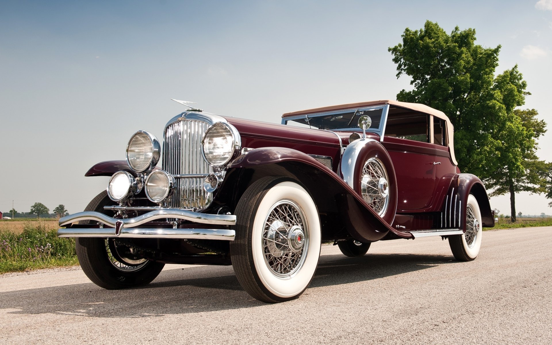 duesenberg sj 272 +2293 cabrio victoria von rollston 1931 dusenberg front retro schönes auto himmel