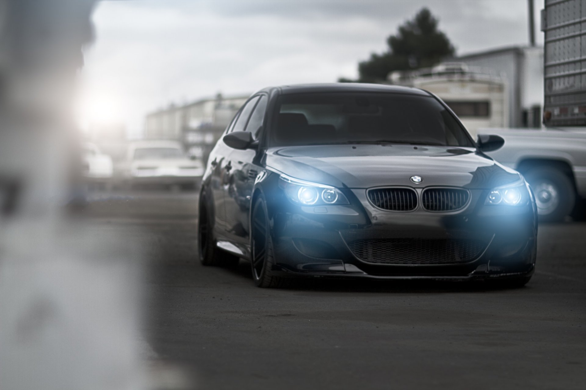 bmw m5 e60 black bmw sedan sport front view headlights road cars blur