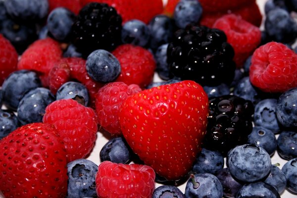 Juicy berries. Strawberries, blackberries, raspberries, blueberries