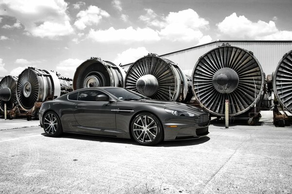 Grey aston martin. Side view