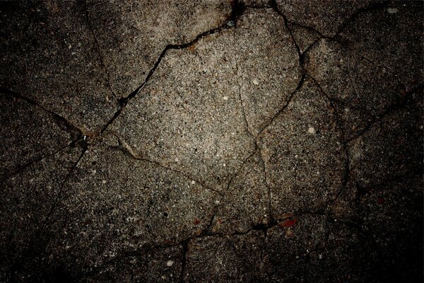 Fissures sur l asphalte. Fissures sur le mur