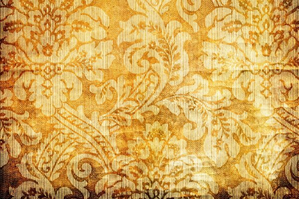 Golden floral pattern under the fabric