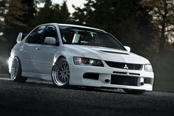 White sports Mitsubishi evo