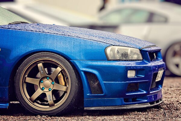 Voiture Nissan r34 bleu tuning