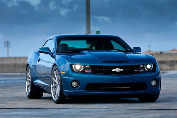 Blue chevy on a blue sky background