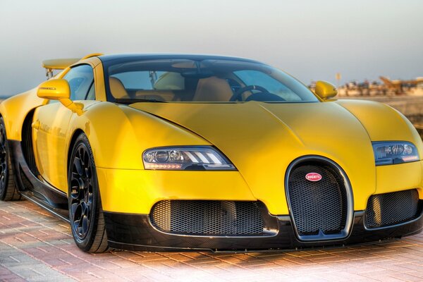 Yellow Bugatti with cast black discs